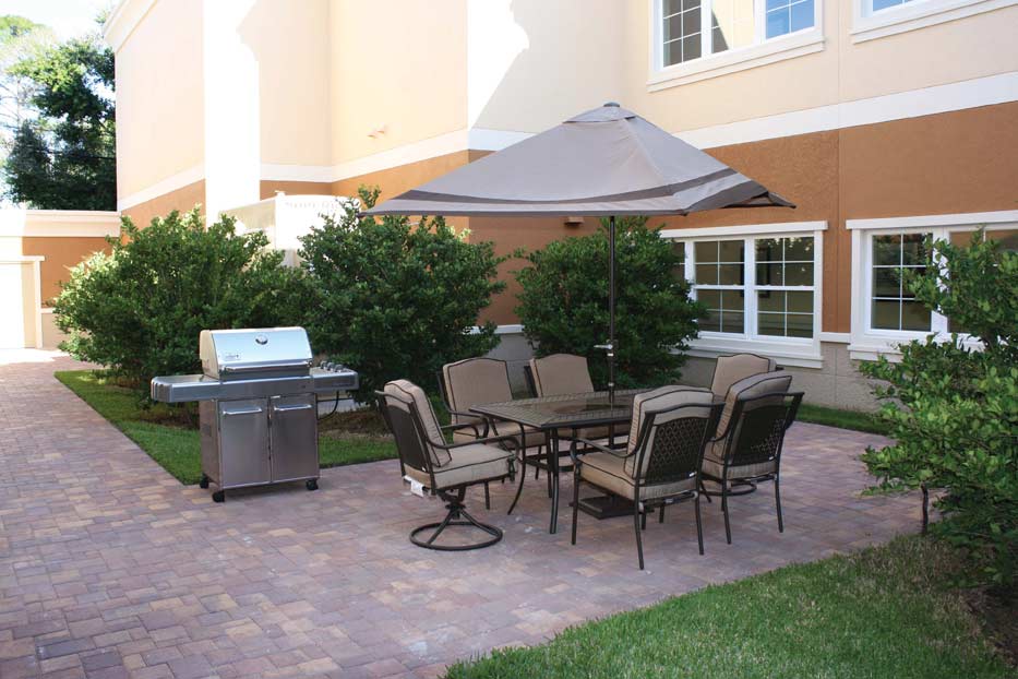 Attractive outdoor spaces bring residents together and offer a place for families to visit and have a meal together.