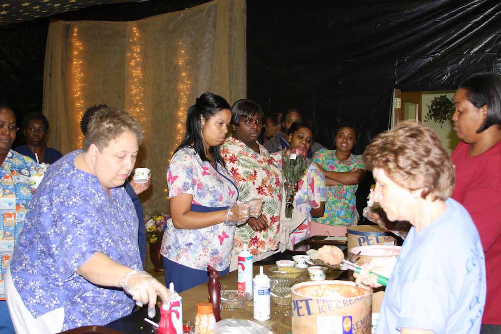 Residents and staff at the Heritage Hall Nursing Facility in Blackstone, Va., make ice cream sundaes.