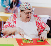 Peggy preparing vegetables