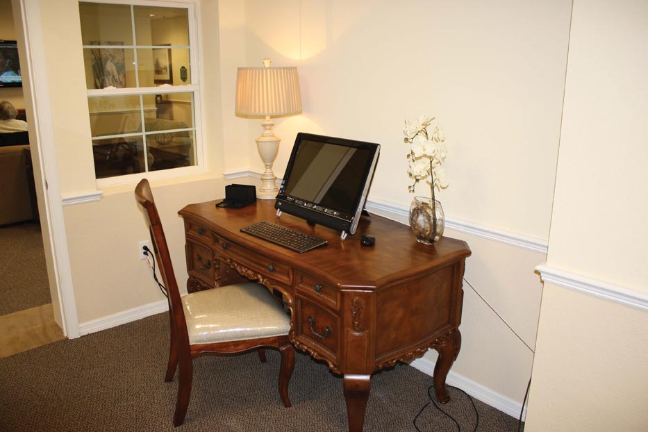 An accessible space for residents to utilize a computer encourages social media interaction and communication.